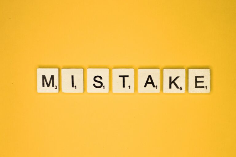 Mistake scrabble letters word on a yellow background
